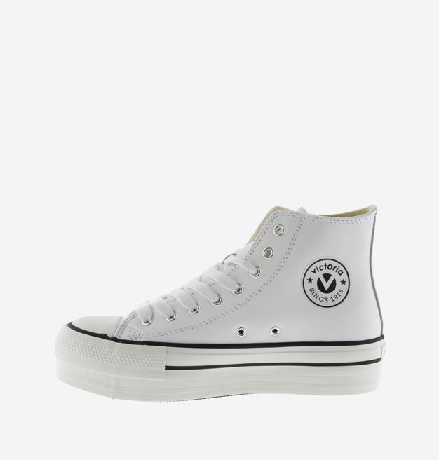 TRIBU DOBLE BOT&Iacute;N EFECTO PIEL